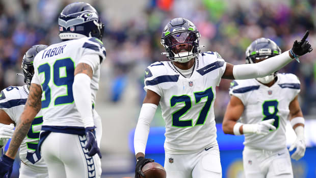 Named a Pro Bowler as a rookie, Tariq Woolen led all cornerbacks with six interceptions in 17 starts.